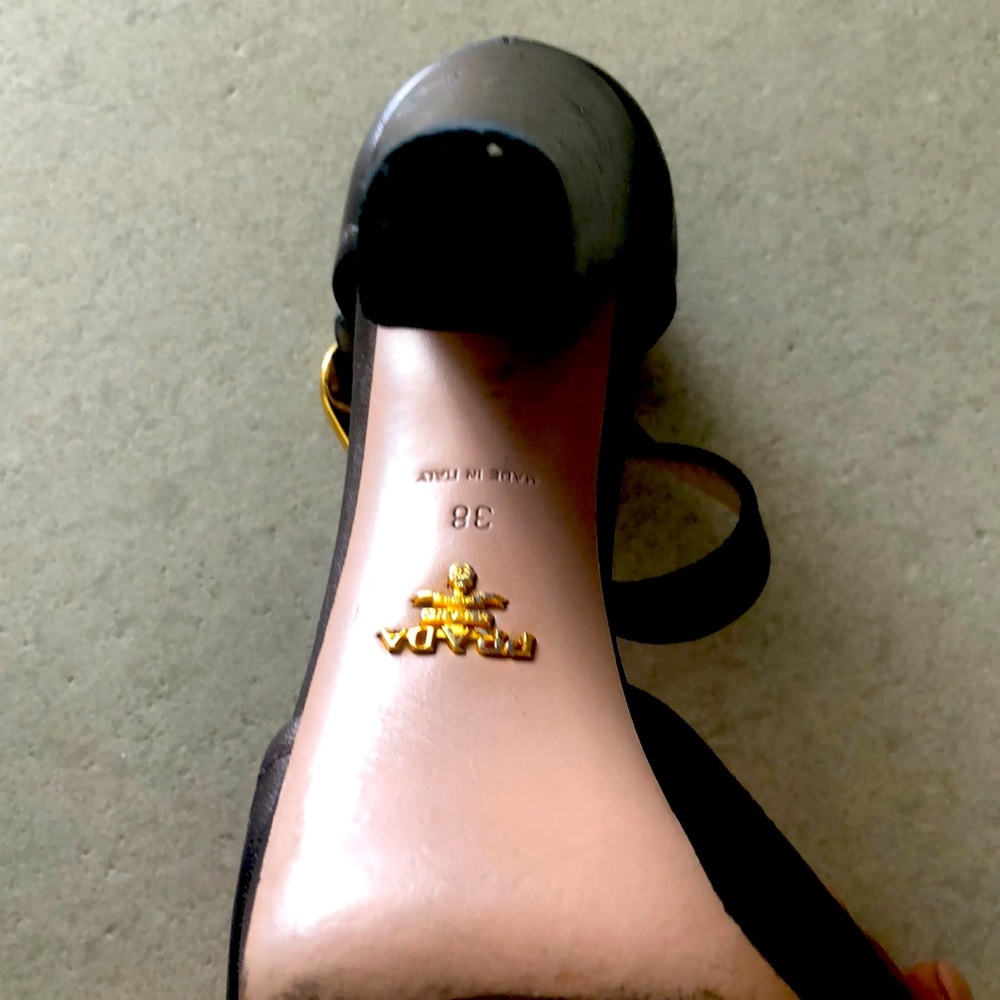 Prada high heel pumps. Brown with gold buckle.